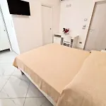 Al 211